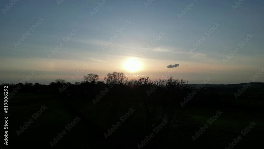 Drone view over dark lands during sunset Drone view over dark lands during sunset