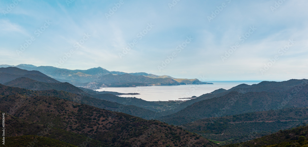Panoramic top view of Cadaques bay (Spain) from mountain pass.