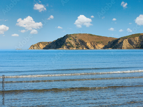 Morning sea coast view from beach (Narta Lagoon, Vlore, Albania). photo