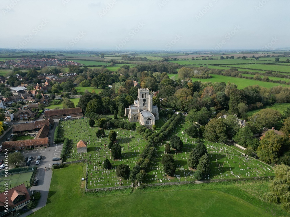 Naklejka premium Aerial view of the grand architecture of St Mary's Church in Thame, Oxfordshire, England