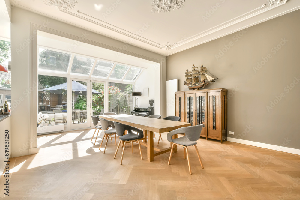 Bright and spacious dining room with modern decor Bright and spacious dining room with modern decor