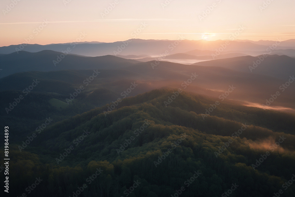 aerial view of mountain range at dawn