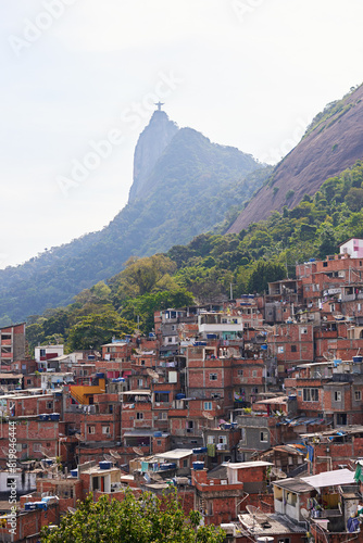 Drone, hill and building or informal housing, architecture and infrastructure for urban development. Town, location and outdoor for tourism travel in aerial view, property and favelas in Brazil
