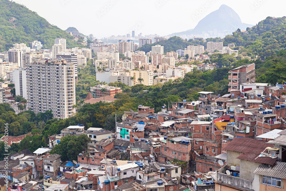 Drone, city and building or housing development, architecture and informal infrastructure. Town, location and outdoor for tourism travel in aerial view, property and favelas settlement in Brazil