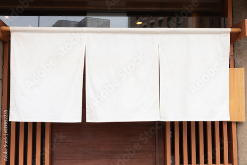 The curtain-like fabric that hangs in front of traditional Japanese restaurants and shops not only serves as a signboard, but holds a larger meaning,