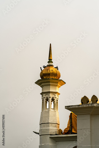 At dawn, the minaret of Ubudiah Mosque in Kuala Kangsar, Perak, Malaysia photo