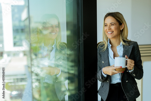 Businesswoman enjoys a coff...