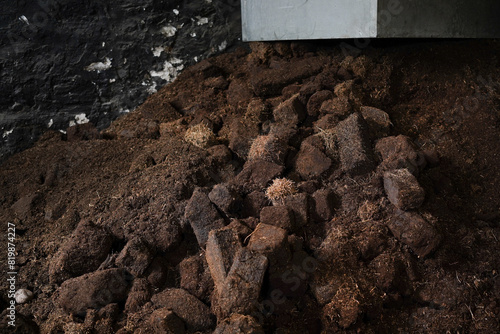 Tableau sur toile Dried lumps of peat in a whisky distillery