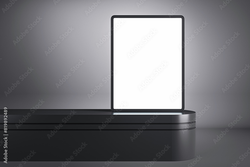 Modern tablet with blank screen on a dark platform, clean design concept on a gray background, digital mockup. 3D Rendering Modern tablet with blank screen on a dark platform, clean design concept on a gray background, digital mockup. 3D Rendering