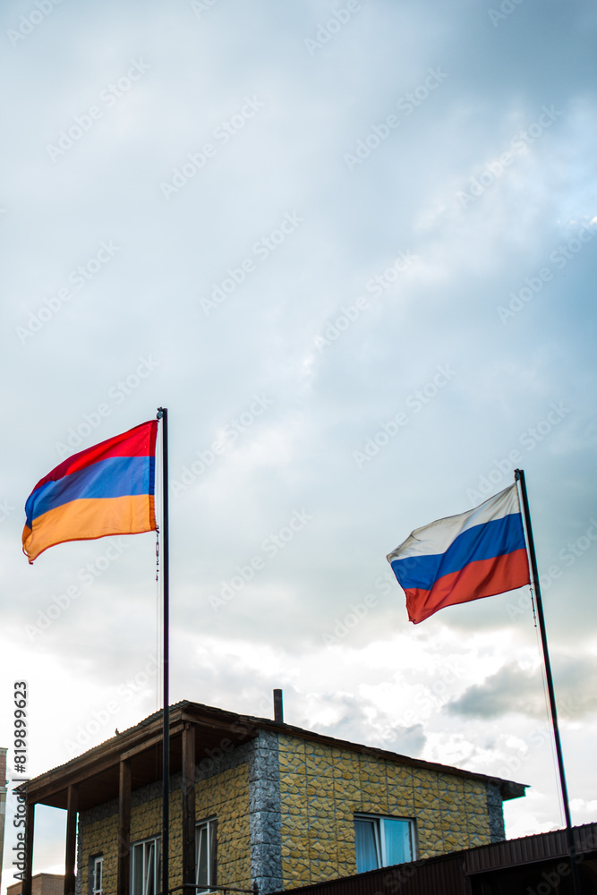 The Russian and Armenian languages are fluttering in the wind