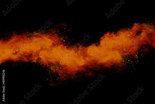 orange powder explosion on white background. Colored cloud. Colorful dust explode. Paint Holi