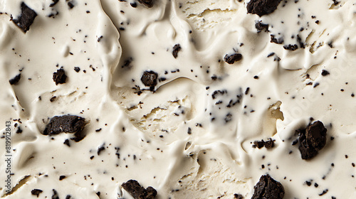 top view of cookies and cream ice cream surface, a closeup of the cookies and cream ice cream texture, showing its smooth, creamy base mixed with chunks of chocolate cookies