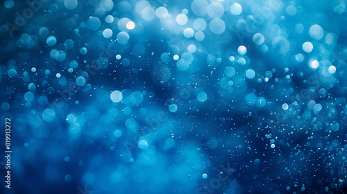 The image is a blue ocean with a lot of bubbles and water droplets