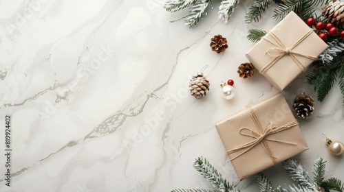 Christmas and New Year holiday background. Xmas greeting card. Christmas gifts on white marble background top view. Flat layout