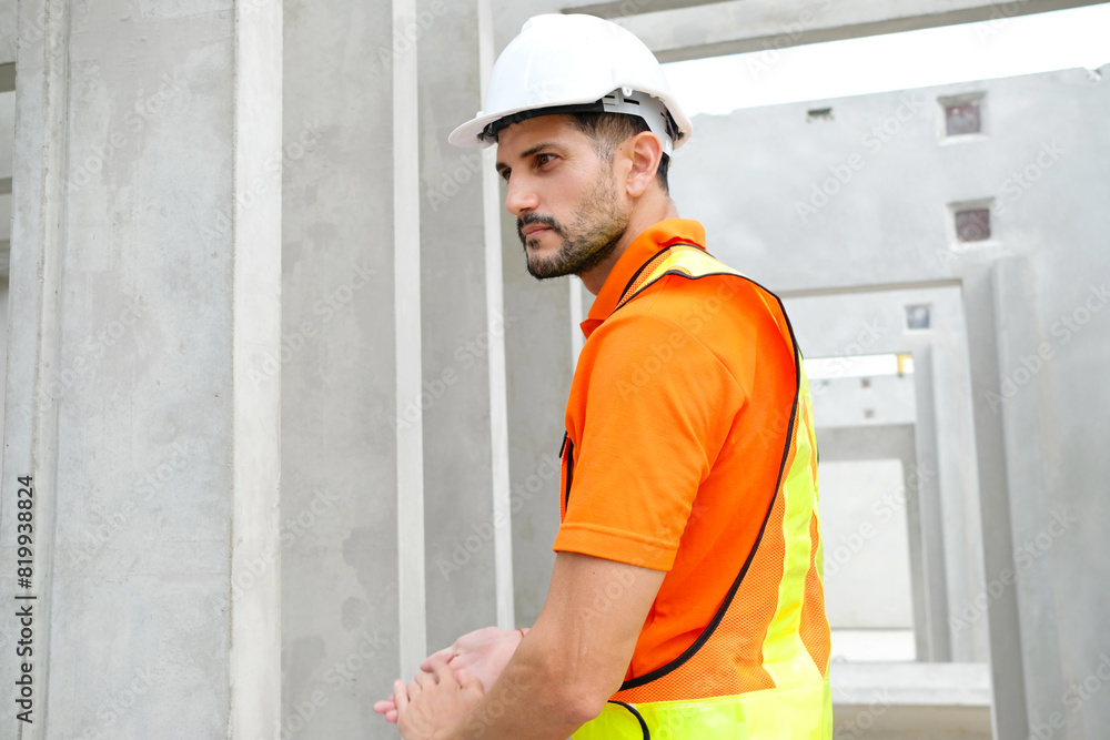 Engineer working at prefabricated wall production factory.