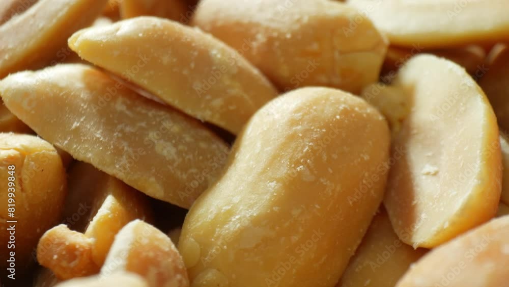 Dive into the intricate world of roasted peanuts with this macro shot. Each half reveals a golden-brown hue, inviting you to explore the delicate textures that make these nuts so irresistible.
Dive into the intricate world of roasted peanuts with this macro shot. Each half reveals a golden-brown hue, inviting you to explore the delicate textures that make these nuts so irresistible.