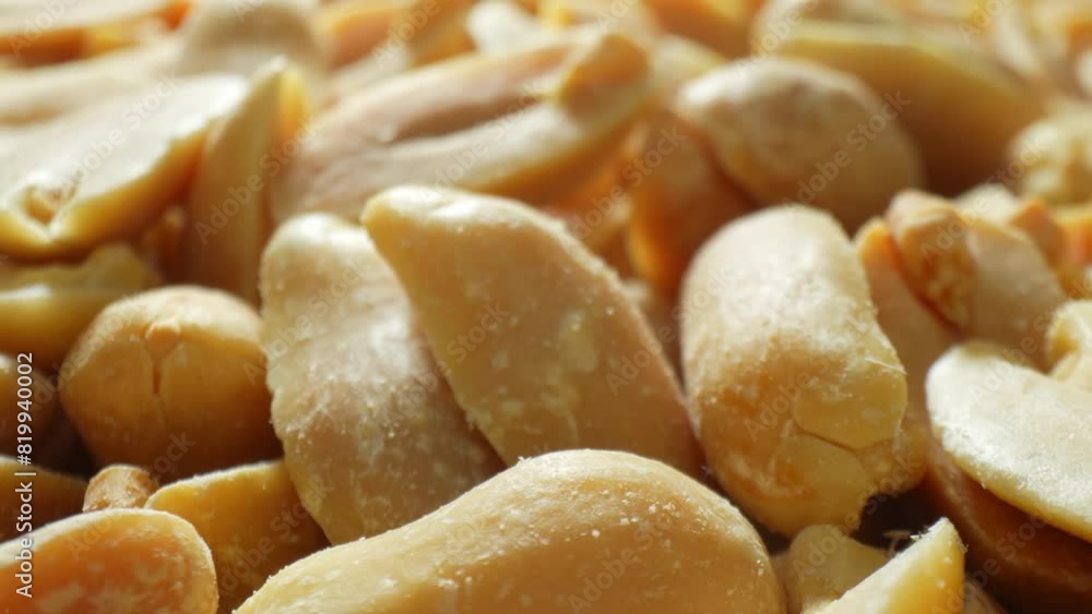 Indulge in the allure of roasted peanuts, their golden-brown shells cracked open to unveil smooth, glossy interiors. Each half, adorned with delicate salt crystals, promises a savory delight.
Indulge in the allure of roasted peanuts, their golden-brown shells cracked open to unveil smooth, glossy interiors. Each half, adorned with delicate salt crystals, promises a savory delight.