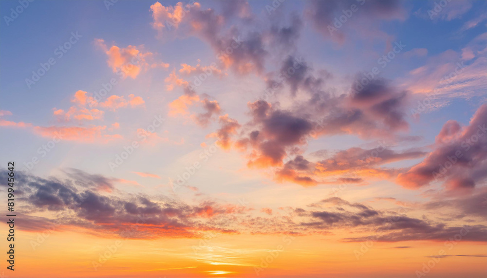 The rays of the sun breaking through the dramatic clouds in the evening or in the morning in the sunset or dawn sky The rays of the sun breaking through the dramatic clouds in the evening or in the morning in the sunset or dawn sky