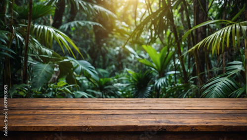 Backdrop of lush jungle foliage with a rustic wooden table in the foreground © xKas
