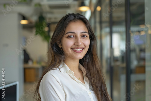 young indian businesswoman standing confidantly