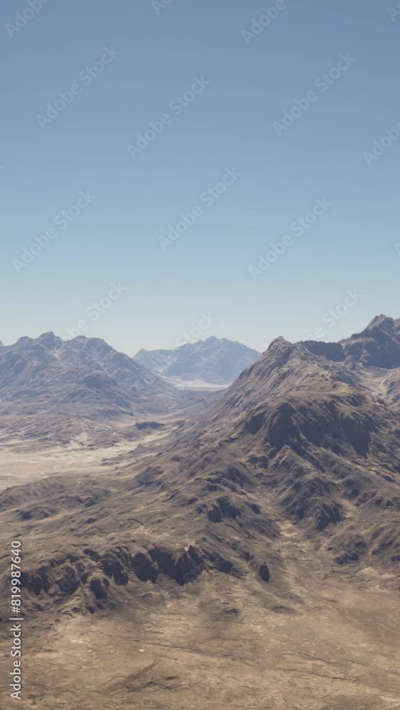 A breathtaking aerial view of a majestic mountain range in the desert A breathtaking aerial view of a majestic mountain range in the desert