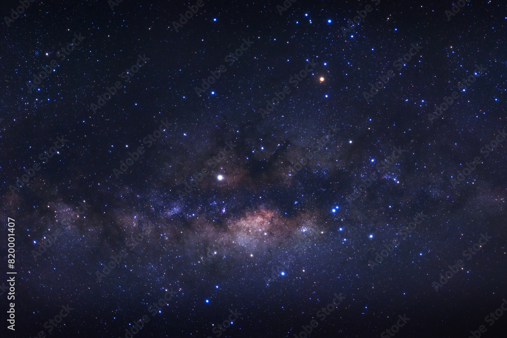 Milky way galaxy with stars and space dust in the universe, Long exposure photograph, with grain.