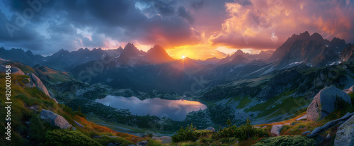 Wallpaper Stunning Sunset Over Mountain Lake with Dramatic Sky and Rugged Peaks