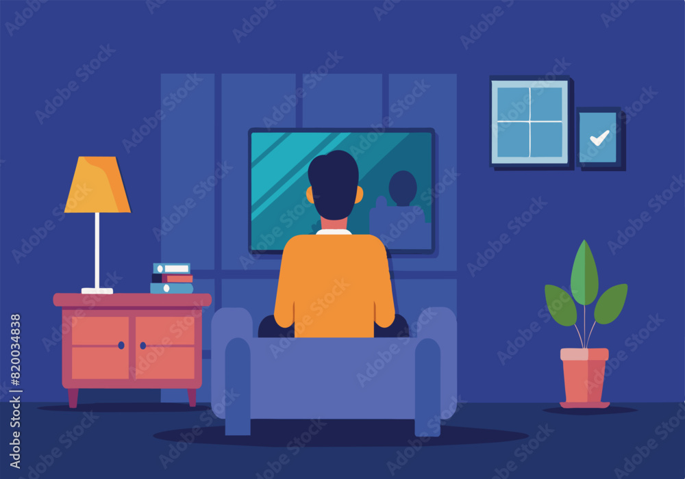 A man is sitting on a couch in a living room watching television A man is sitting on a couch in a living room watching television