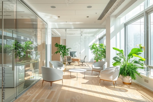 Bright modern office lounge with large windows  plants  and comfortable seating