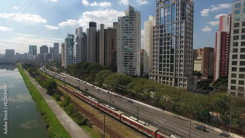 Drone view of train and buildings in Marginal Pinheiros photo