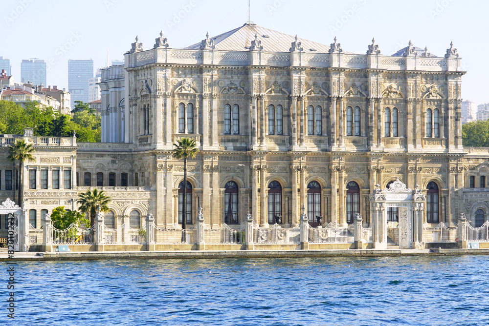 View from the Bosphorus to the Sultan's Dolmabahce Palace in Istanbul, Türkiye. Architecture in the Ottoman Baroque style - creations of the Balyan family.
