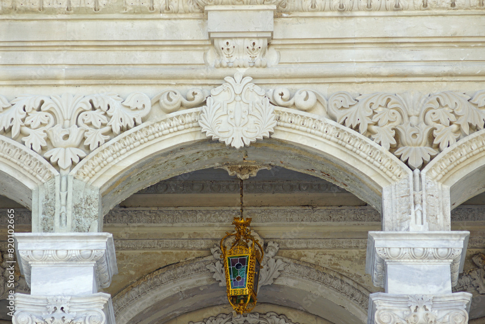 Close-up decoration of the Kucuksu Palace entrance. A fragment of the facade of the Sultan's residence, built on the shores of the Bosphorus Strait in Istanbul (Turkey).