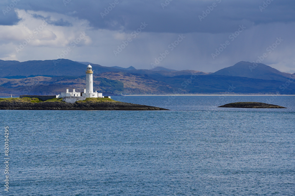Lismore Lighthouse on Eilean Musdile in Scotland. It is a lighthouse on a small islet in the south west of Lismore island. Lismore Lighthouse on Eilean Musdile in Scotland. It is a lighthouse on a small islet in the south west of Lismore island.