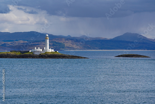 Lismore Lighthouse on Eilean Musdile in Scotland. It is a lighthouse on a small islet in the south west of Lismore island. photo