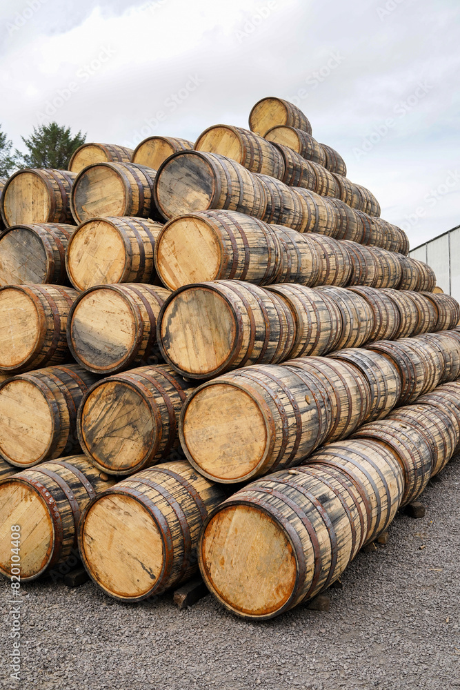Empty whisky casks in a whisky distillery Empty whisky casks in a whisky distillery