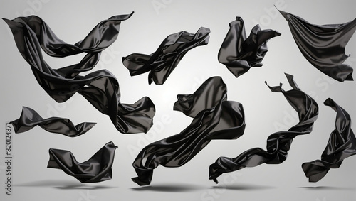 The image contains 10 pieces of black fabric, appearing to be in motion.