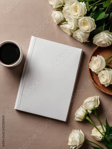 blank paper on the office table and a glass of coffee and a decorative flower vase on the table. copy space. mockup. Wooden table with coffee paper keyboard placed at the office. Top view