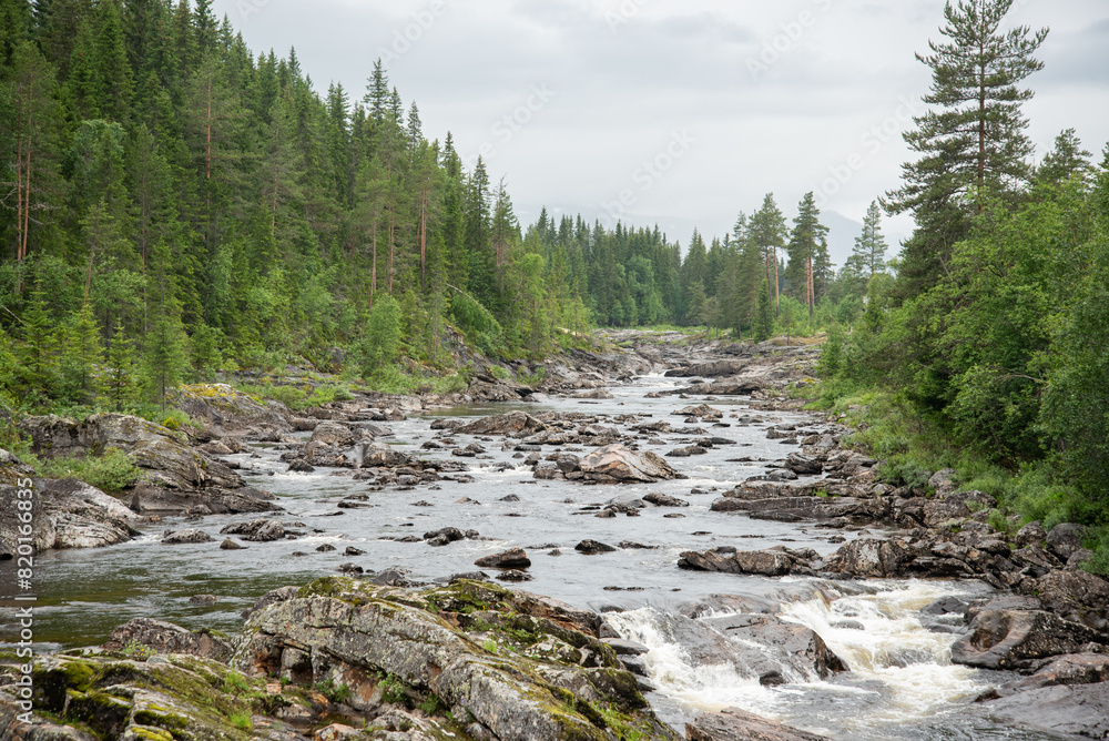 Norwegian River at the Small Waterfall Section Norwegian River at the Small Waterfall Section