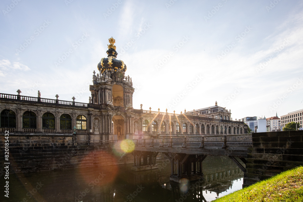 The Dresden Zwinger, a landmark of Baroque architecture. Historical buildings in the style of a castle. Orangery at sunrise in the morning in the city of Dresden, Saxony, Germany The Dresden Zwinger, a landmark of Baroque architecture. Historical buildings in the style of a castle. Orangery at sunrise in the morning in the city of Dresden, Saxony, Germany
