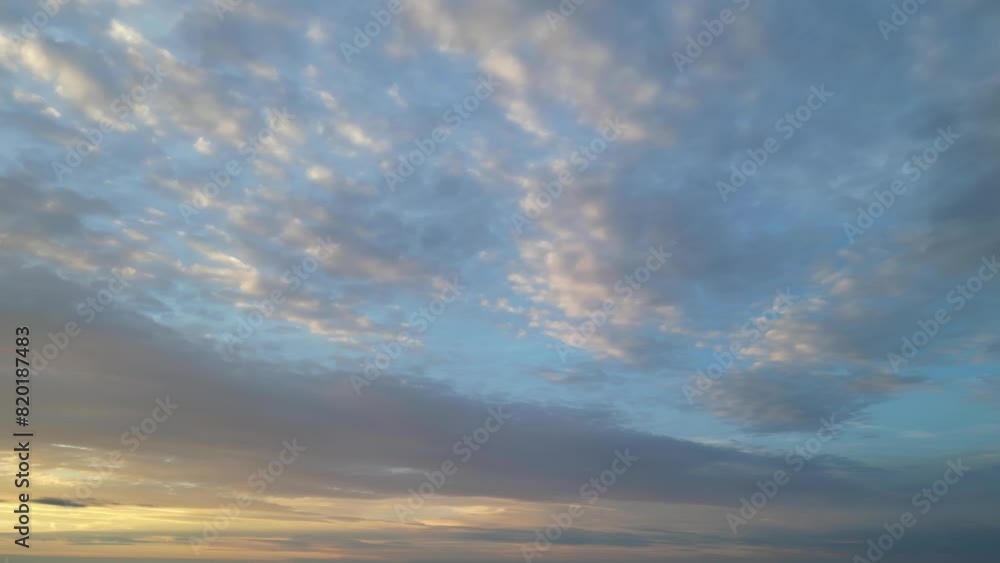 High Angle View of Dramatic Sky and Orange Clouds over England During Sunset High Angle View of Dramatic Sky and Orange Clouds over England During Sunset