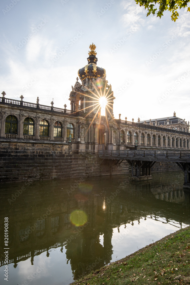 The Dresden Zwinger, a landmark of Baroque architecture. Historical buildings in the style of a castle. Orangery at sunrise in the morning in the city of Dresden, Saxony, Germany The Dresden Zwinger, a landmark of Baroque architecture. Historical buildings in the style of a castle. Orangery at sunrise in the morning in the city of Dresden, Saxony, Germany