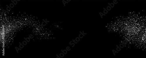 Glittering stars with silver shimmering swirls, shiny  design. Magical motion, sparkling lines on a black background.