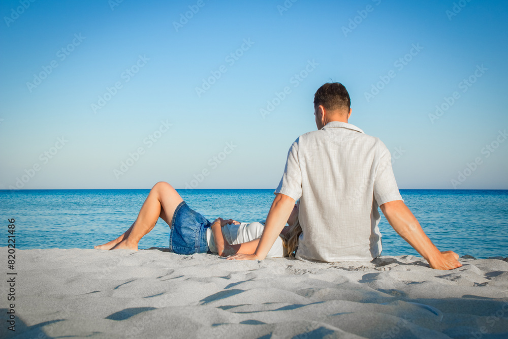 Fototapeta premium happy loving couple by the sea in the nature