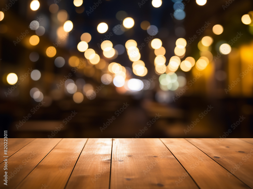 Abstract blurred restaurant lights create wooden tables backdrop Abstract blurred restaurant lights create wooden tables backdrop