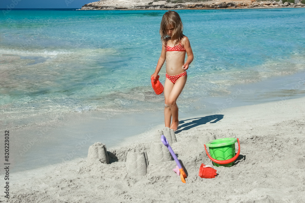 happy child playing by the sea outdoors happy child playing by the sea outdoors