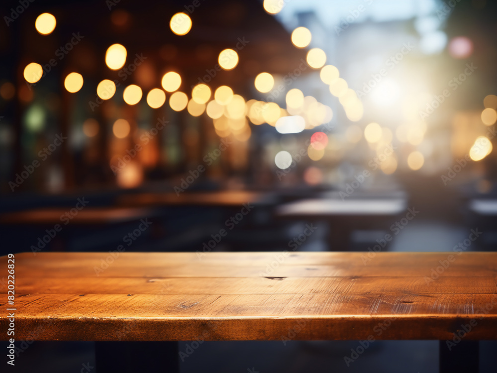 Amidst cafe chatter, an empty wooden table offers space Amidst cafe chatter, an empty wooden table offers space