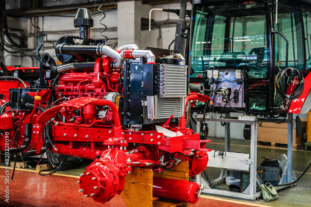 Tractor industry manufacture. New tractors on factory line. Production of agricultural machinery Tractor industry manufacture. New tractors on factory line. Production of agricultural machinery