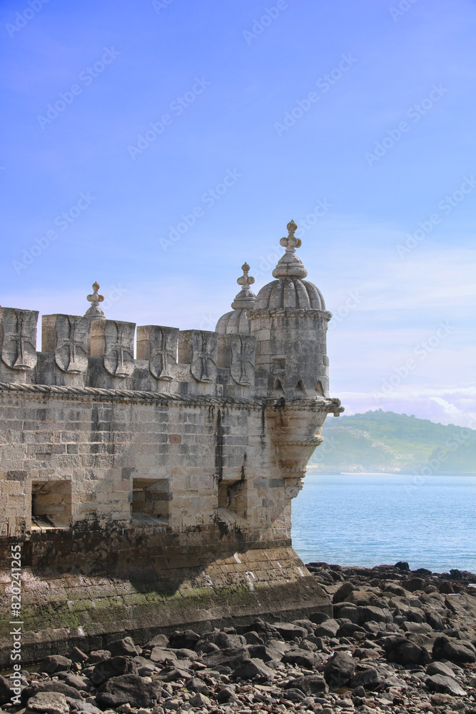 Fototapeta premium The Belém Tower is an old military construction, located at the mouth of the Tagus River, in the Santa Maria de Belém neighborhood, together with the Jerónimos Monastery in Lisbon, Portugal.