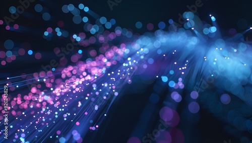 A closeup of an optical fiber cable, glowing with blue and purple lights against the black background 