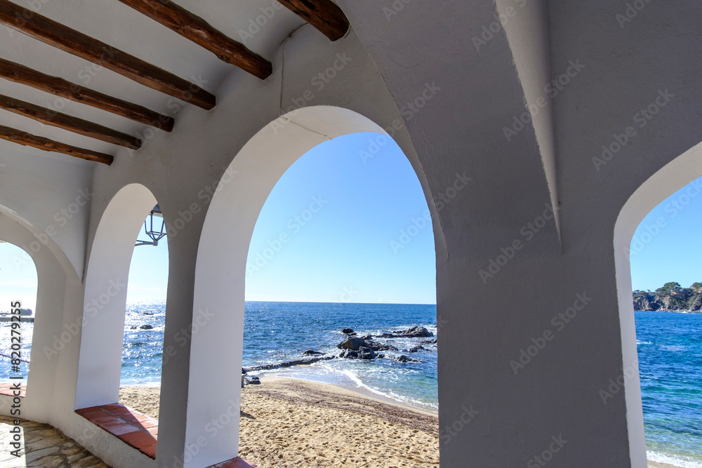 Beautiful arch cover terrace in a beautiful beach landscape in Costa Brava, Catalonia, Mediterranean Sea Beautiful arch cover terrace in a beautiful beach landscape in Costa Brava, Catalonia, Mediterranean Sea